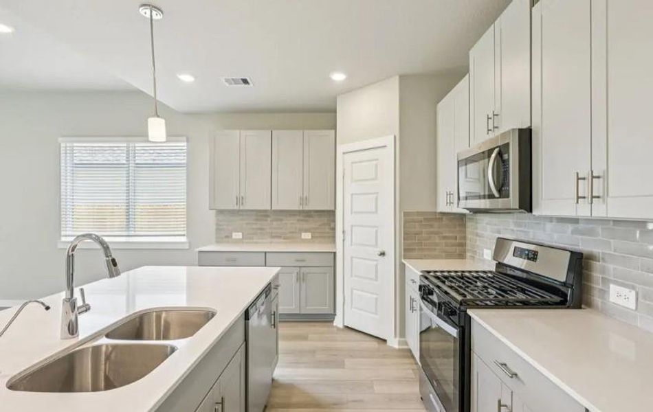 Photo is not of the actual home, but is an inspirational photo of builder’s model home and may depict options, furnishings, and/or decorator features that are not included