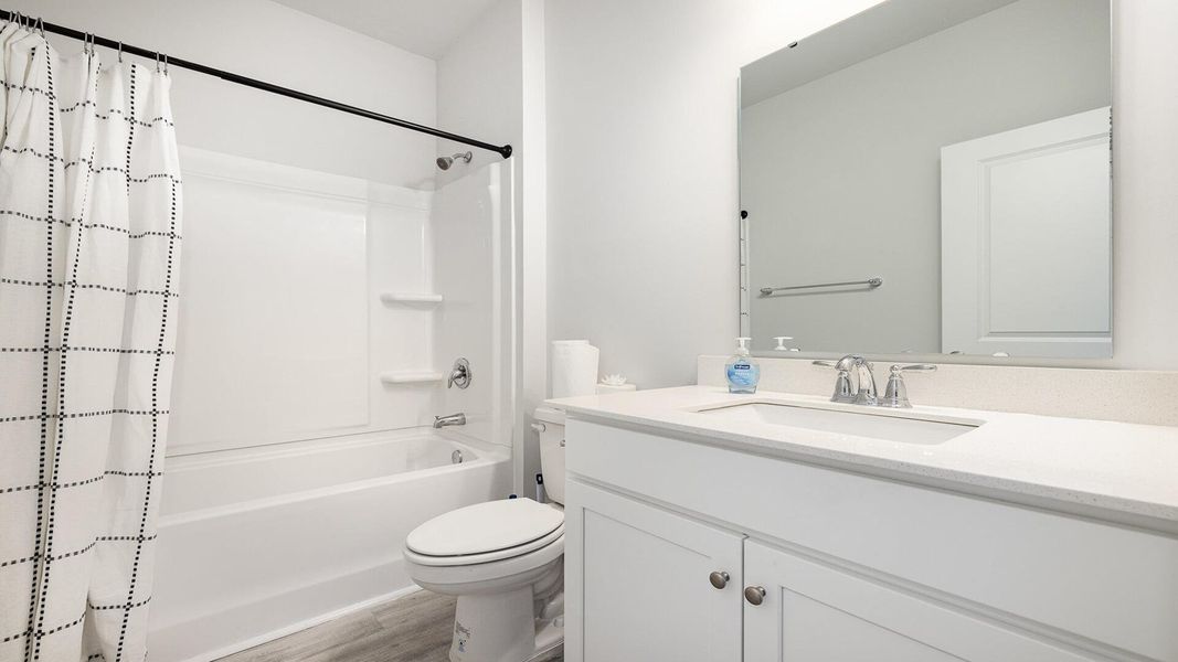 Furnished interior view inside a new home in Pine Hills at Cane Bay, Summerville (Image 10).