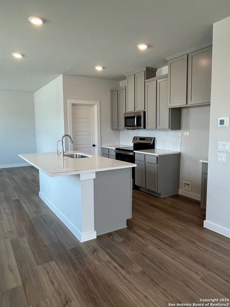 Furnished interior view inside a new home in Highland Ridge, New Braunfels (Image 3). Furnished interior view inside a new home in Highland Ridge, New Braunfels (Image 3).
