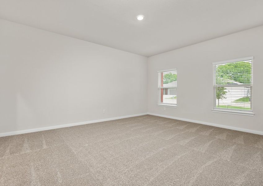 The master bedroom has two large windows. The master bedroom has two large windows.