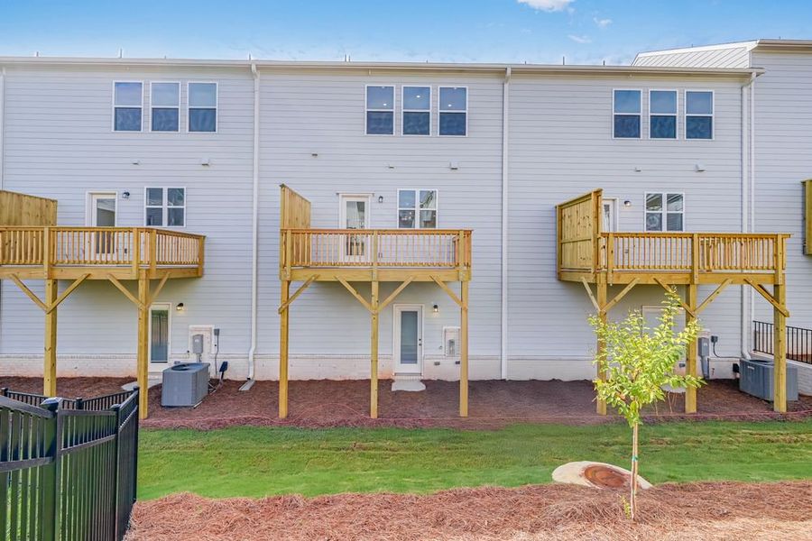 Front exterior of a new home in Chandler Run, Tucker, GA, highlighting curb appeal (Image 1).