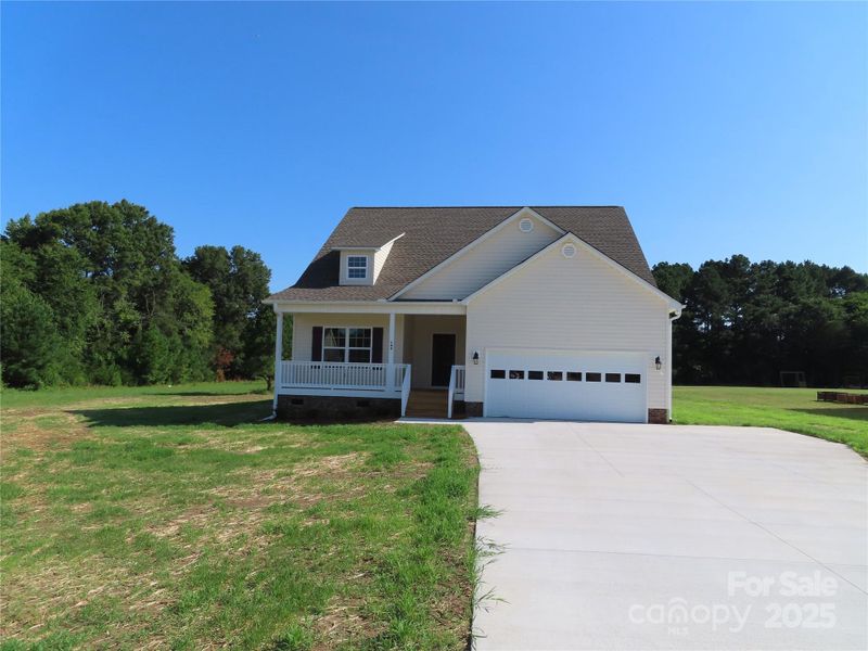 Front exterior of a new home in , Rock Hill, SC, highlighting curb appeal (Image 1).