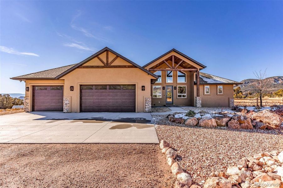 Front exterior of a new home in , Cañon City, CO, highlighting curb appeal (Image 23). Front exterior of a new home in , Cañon City, CO, highlighting curb appeal (Image 23).