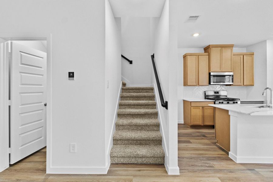 Furnished interior view inside a new home in Grand West, Houston (Image 6).