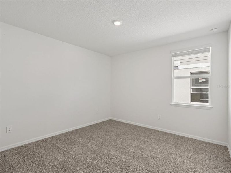 Spacious, unfurnished interior of a new home in Oakfield Trails - Signature Series, Parrish (Image 19). Spacious, unfurnished interior of a new home in Oakfield Trails - Signature Series, Parrish (Image 19).