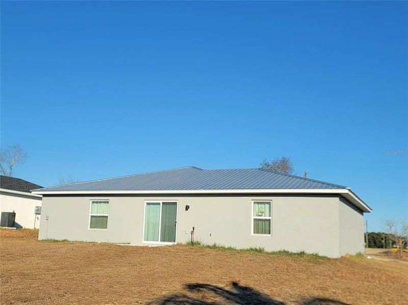Exterior details and patio area of a home in , Ocala (Image 21).