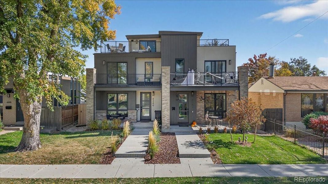 Front exterior of a new home in , Denver, CO, highlighting curb appeal (Image 1).