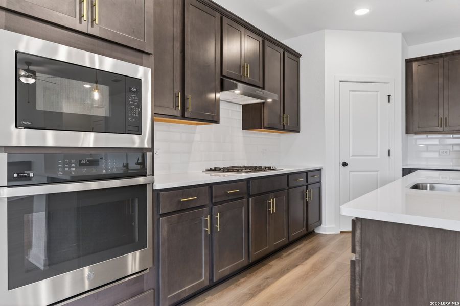 Furnished interior view inside a new home in Nopal Valley, San Antonio (Image 6).