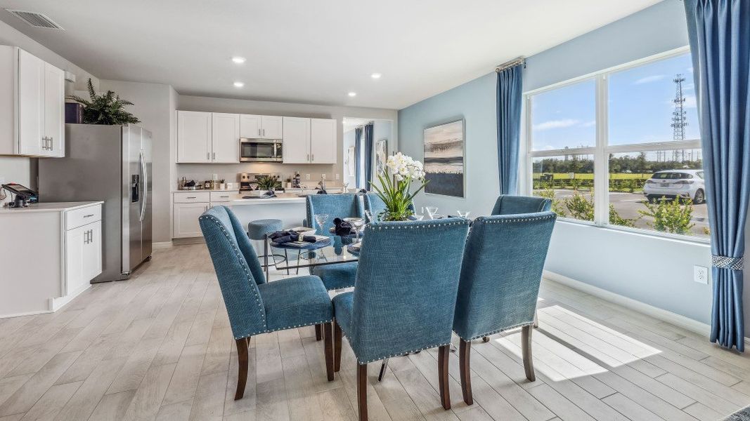 Representative furnished interior of a home built from the JEMISON by D.R. Horton in Asher Park, Lehigh Acres (Image 9).