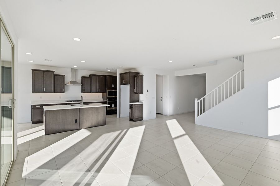 Representative furnished interior of a home built from the Triumph by Taylor Morrison in Artisan at Asante Encore Collection, Surprise (Image 8). Representative furnished interior of a home built from the Triumph by Taylor Morrison in Artisan at Asante Encore Collection, Surprise (Image 8).