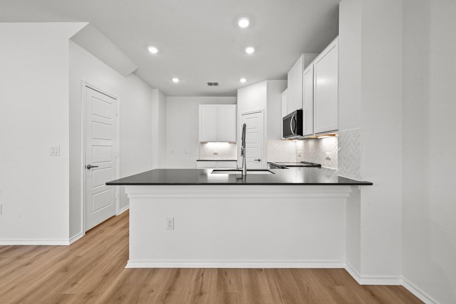 Furnished interior view inside a new home in Creekside at Estancia, Austin (Image 7). Furnished interior view inside a new home in Creekside at Estancia, Austin (Image 7).