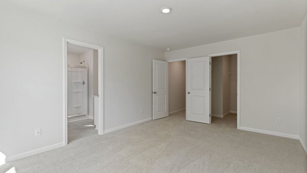 Spacious, unfurnished interior of a new home in Copper Run South, Durham (Image 15).