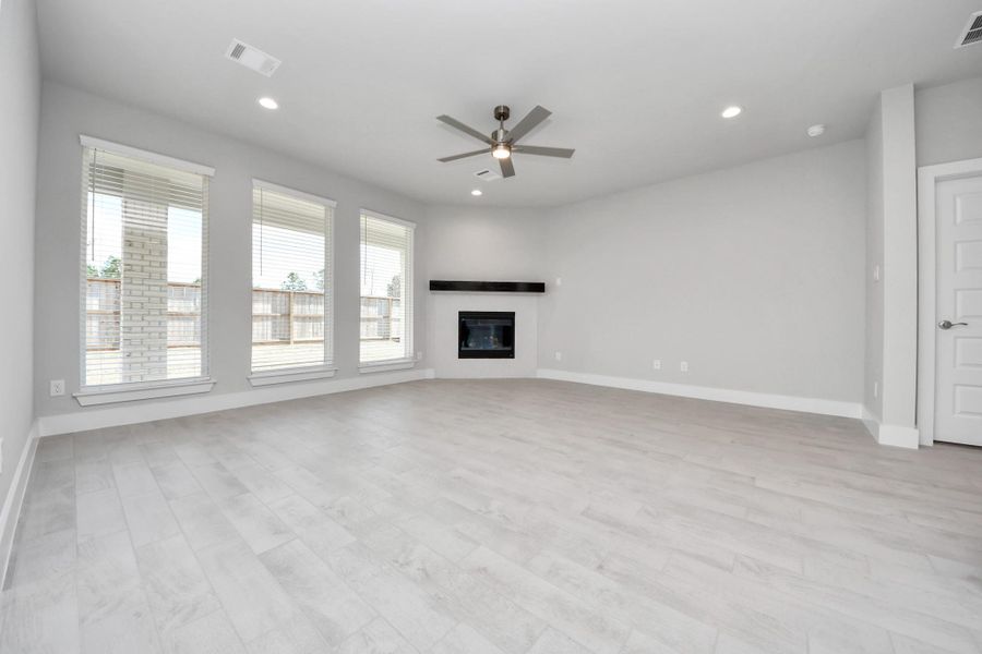 Take another glimpse into the heart of the home with this additional view of the family room—a sprawling space ready to accommodate all your gatherings. Sample photo of completed home with similar floor plan. Actual colors and selections may vary. Take another glimpse into the heart of the home with this additional view of the family room—a sprawling space ready to accommodate all your gatherings. Sample photo of completed home with similar floor plan. Actual colors and selections may vary.