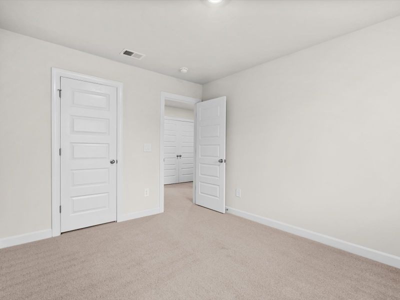 Spacious, unfurnished interior of a new home in Crossing at Abner Creek Townes, Greer (Image 18). Spacious, unfurnished interior of a new home in Crossing at Abner Creek Townes, Greer (Image 18).