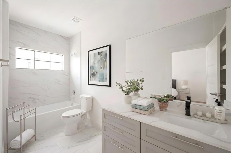 Easy-maintenance bathroom featuring modern wall panels instead of traditional grout lines. [virtual stage]