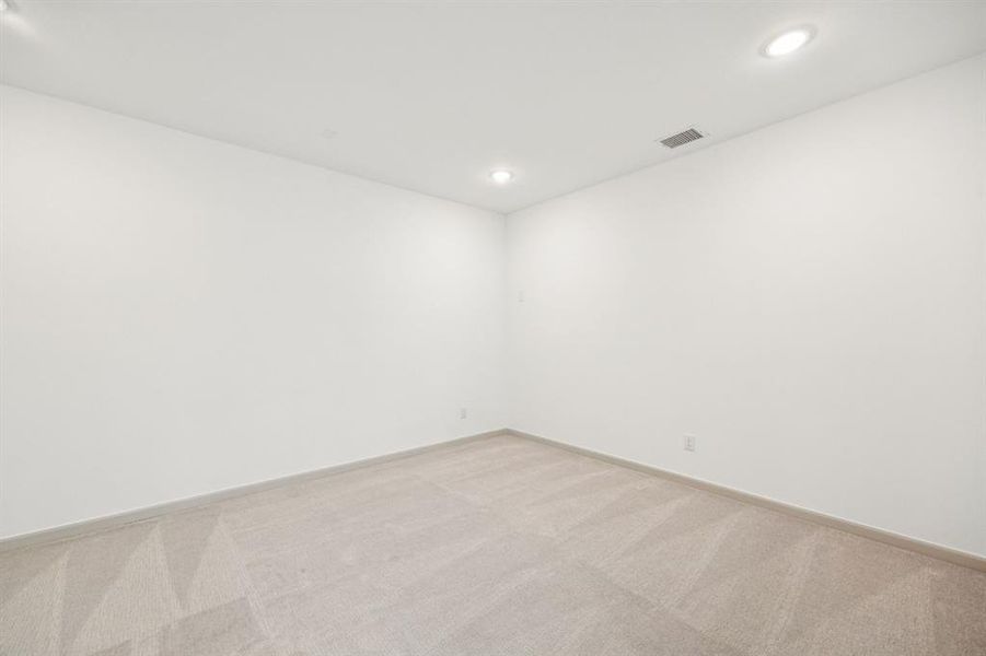 The spacious media room and adjacent game room create the ultimate entertainment zone!