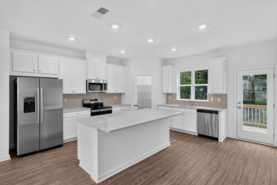 Furnished interior view inside a new home in Somerset at Veterans Memorial, Mableton (Image 9).