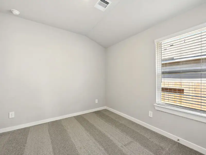 Spacious, unfurnished interior of a new home in Sanford Farms - Premier Series, Waller (Image 13).