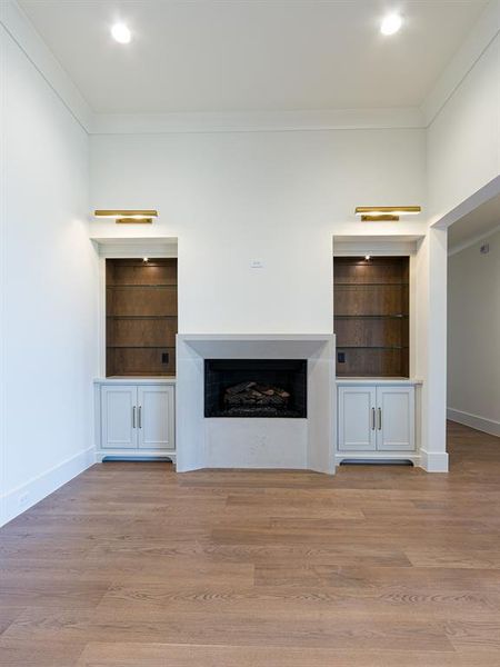 The Keeping Room with storage cabinets and shelves and gas fireplace is a great place to cozy up with a good book!