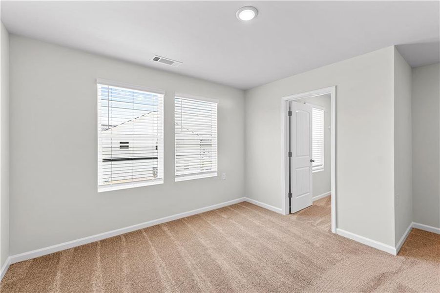 Spacious, unfurnished interior of a new home in The Grove At Mundy Mill, Gainesville (Image 11).