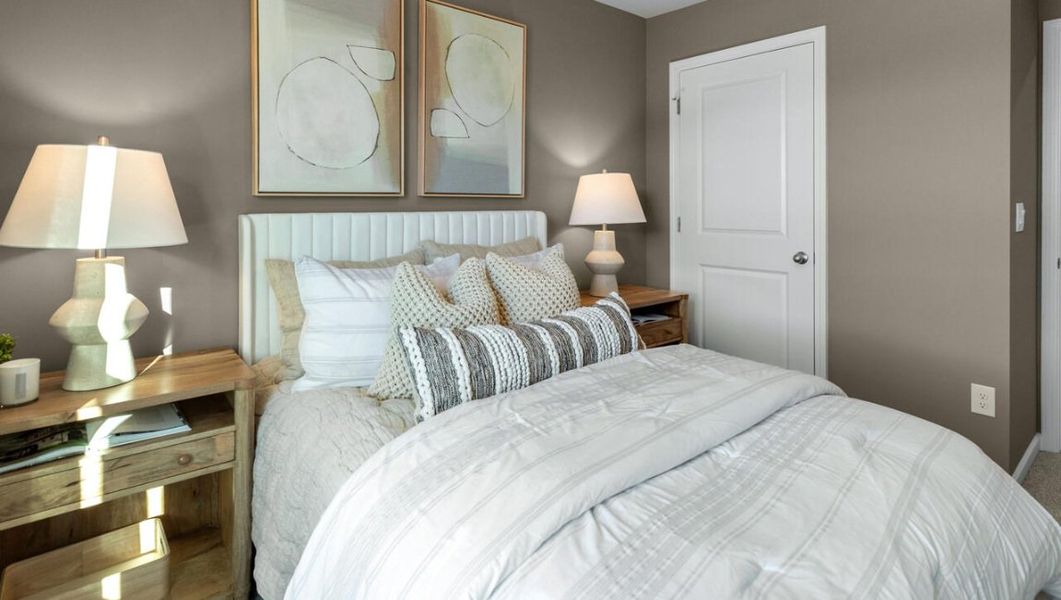 Representative furnished interior of a home built from the PEARSON TH by D.R. Horton in Grayson Park Duets, Leland (Image 28).