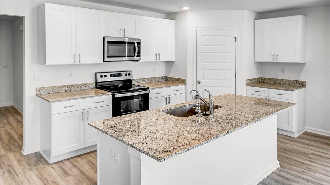 Representative furnished interior of a home built from the Lismore by D.R. Horton in Owl's Head Farms, Freeport (Image 6).