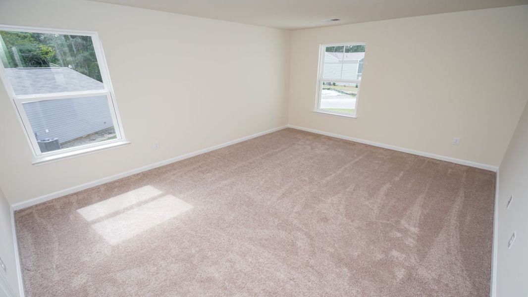 Spacious, unfurnished interior of a new home in The Pines at Blake Farm, Wilmington (Image 30).