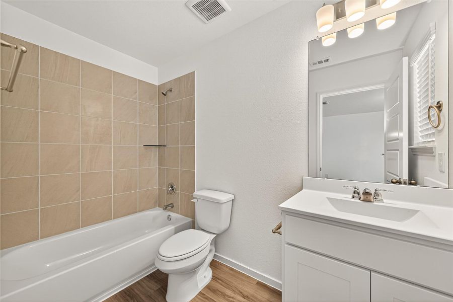 Furnished interior view inside a new home in Mill Creek Trails, Magnolia (Image 20).