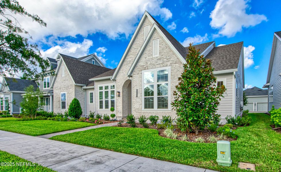 Front exterior of a new home in Seven Pines, Jacksonville, FL, highlighting curb appeal (Image 1).