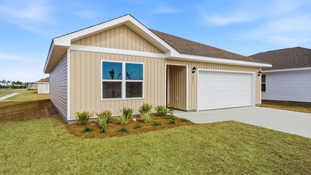 Front exterior of a new home in Liberty, Panama City, FL, highlighting curb appeal (Image 18).