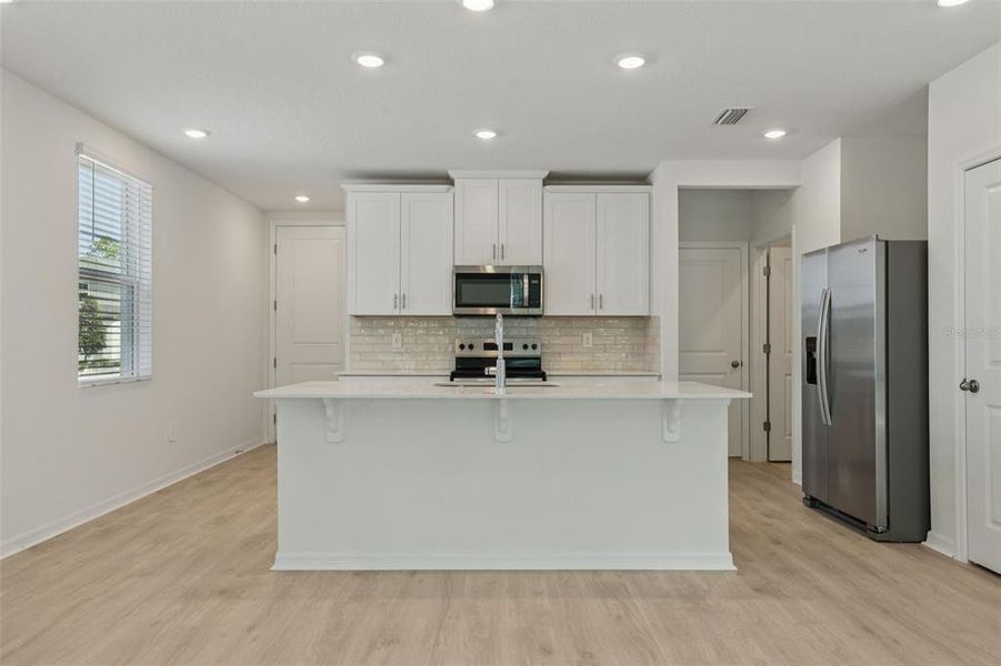 Furnished interior view inside a new home in Bradford Park, Ormond Beach (Image 6).