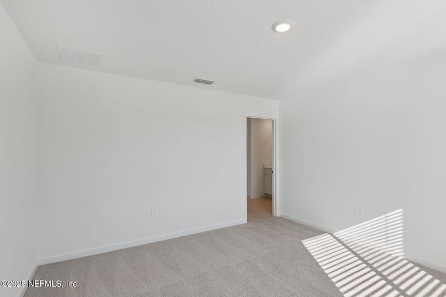Spacious, unfurnished interior of a new home in Cypress Meadows - Signature Series, Jacksonville (Image 23).