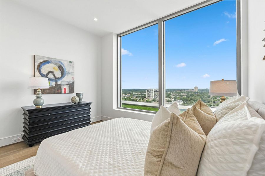 Different perspective of the same guest bedroom with spectacular views Different perspective of the same guest bedroom with spectacular views