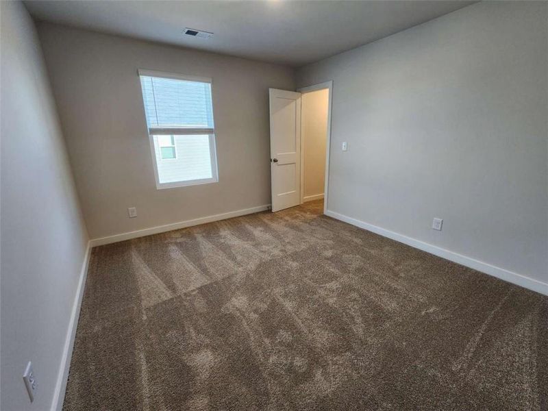 Spacious, unfurnished interior of a new home in Southern Hills, McDonough (Image 34).