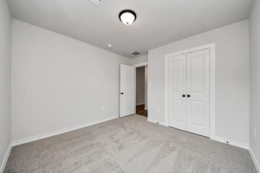 Spacious, unfurnished interior of a new home in The Enclave at Spring Branch, Conroe (Image 34). Spacious, unfurnished interior of a new home in The Enclave at Spring Branch, Conroe (Image 34).