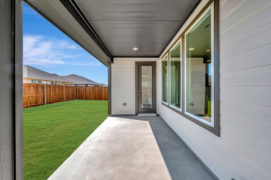 Exterior details and patio area of a home in The Meadows, Denton (Image 3).