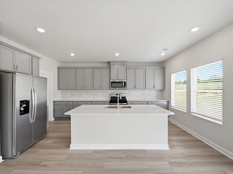 Furnished interior view inside a new home in The Farm at Wells Creek - Signature Collection, Gray Court (Image 3). Furnished interior view inside a new home in The Farm at Wells Creek - Signature Collection, Gray Court (Image 3).