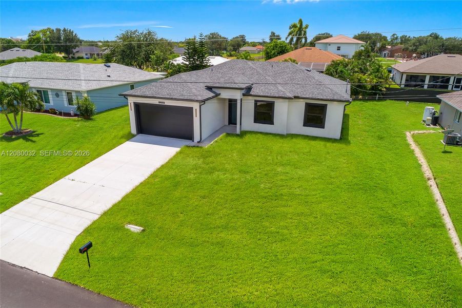 Front exterior of a new home in , Cape Coral, FL, highlighting curb appeal (Image 18).