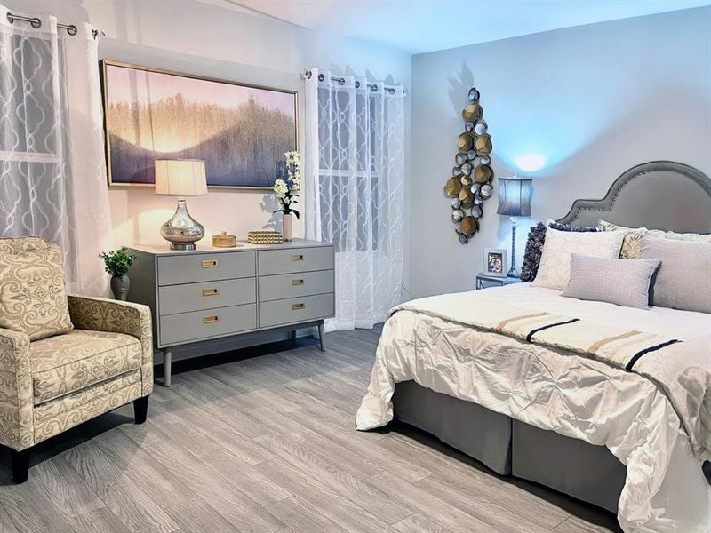 Bedroom with light wood-style flooring