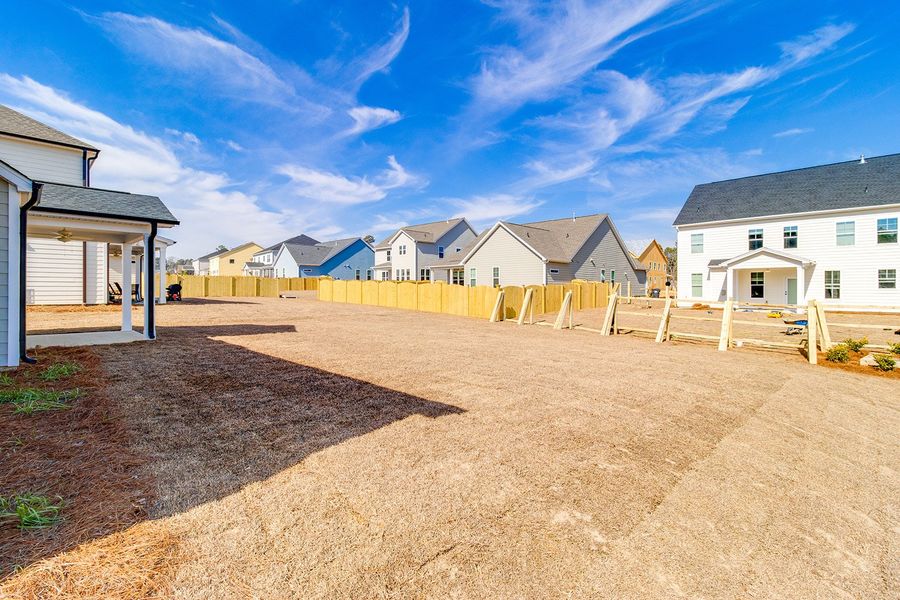 Exterior details and patio area of a home in Pebble Branch, Chapin (Image 4).