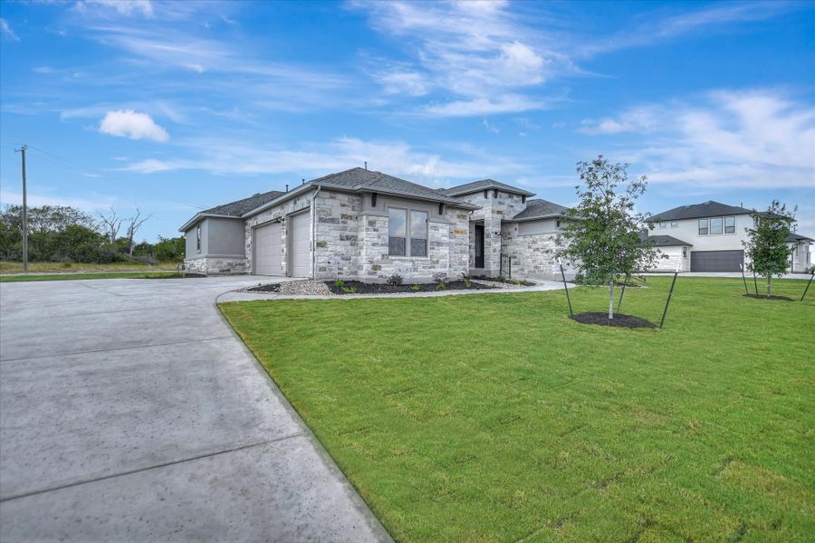 Representative exterior photo of a completed home built from the Bandera II by Giddens Homes in Whispering Wind, Bertram, TX (Image 29).