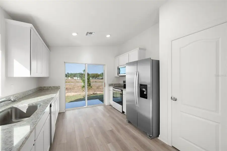 Furnished interior view inside a new home in Tula Parc, Astatula (Image 7). Furnished interior view inside a new home in Tula Parc, Astatula (Image 7).