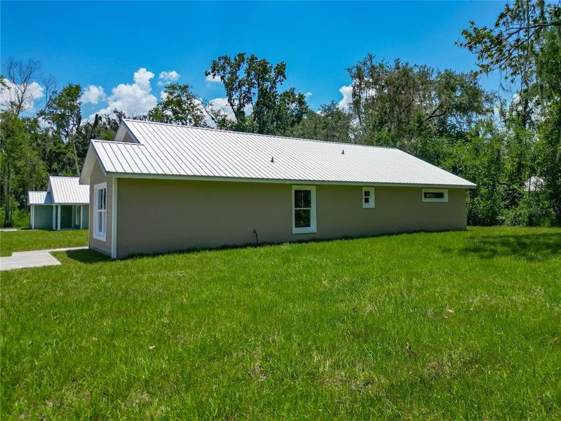 Exterior details and patio area of a home in , Lake Panasoffkee (Image 26).