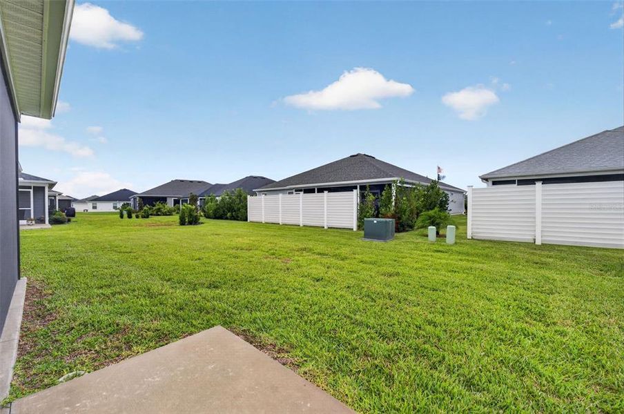 Exterior details and patio area of a home in , The Villages (Image 25).
