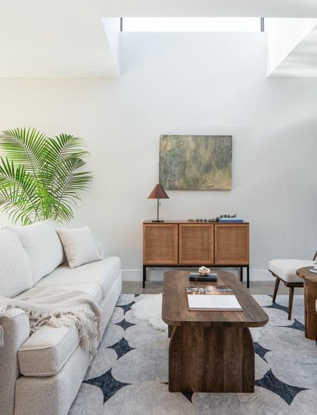 Living room with baseboards and wood finished floors