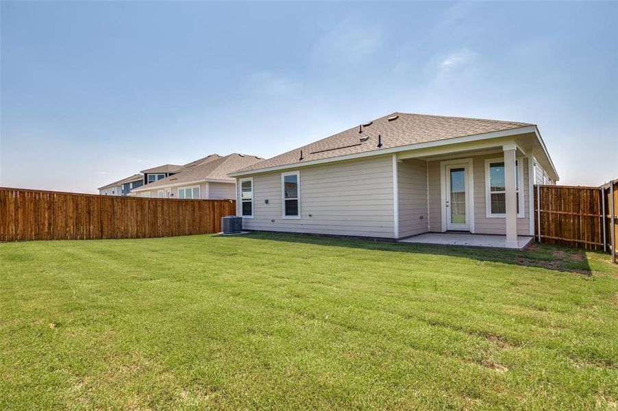 Front exterior of a new home in Cottonwood Creek, Seagoville, TX, highlighting curb appeal (Image 2). Front exterior of a new home in Cottonwood Creek, Seagoville, TX, highlighting curb appeal (Image 2).