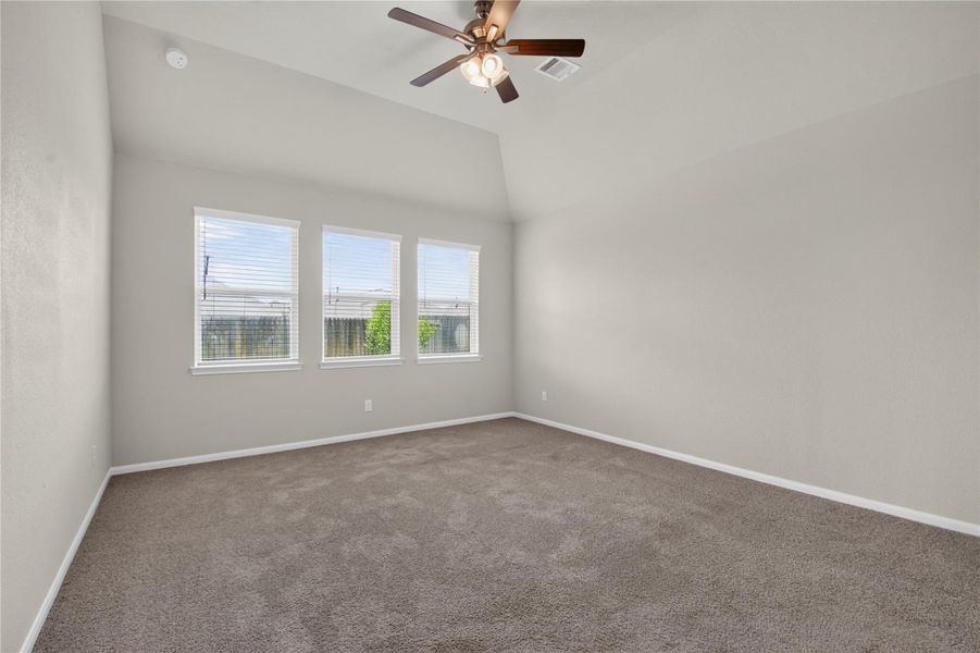 Primary bedroom. This photo shows a clean, neutral-toned bedroom with carpeted flooring. It features a double-door closet and a simple ceiling light fixture, creating a cozy, move-in-ready space. Primary bedroom. This photo shows a clean, neutral-toned bedroom with carpeted flooring. It features a double-door closet and a simple ceiling light fixture, creating a cozy, move-in-ready space.