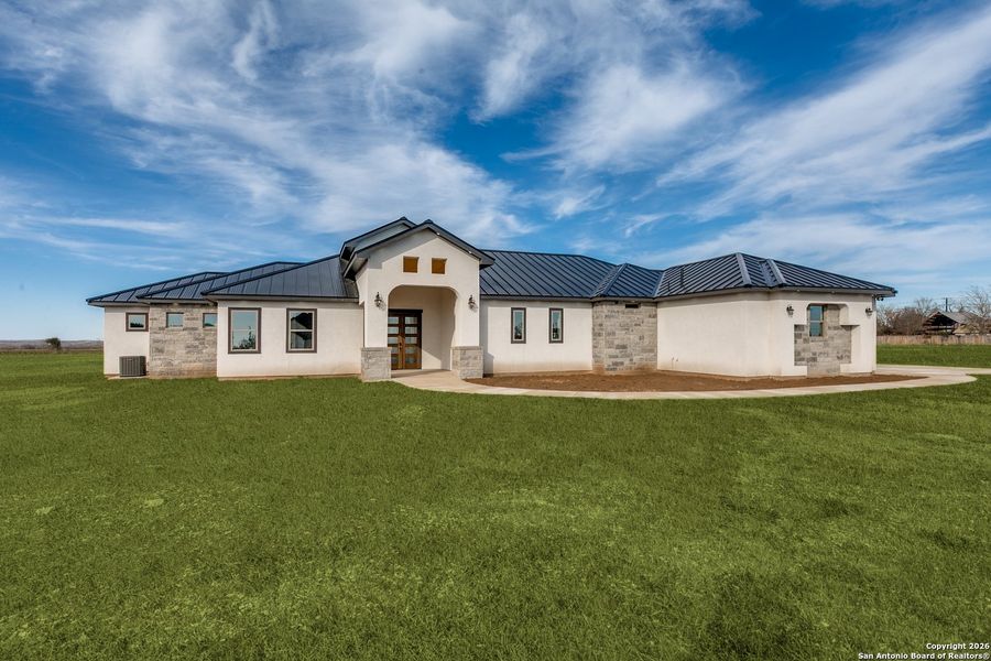 Exterior details and patio area of a home in , Castroville (Image 26).