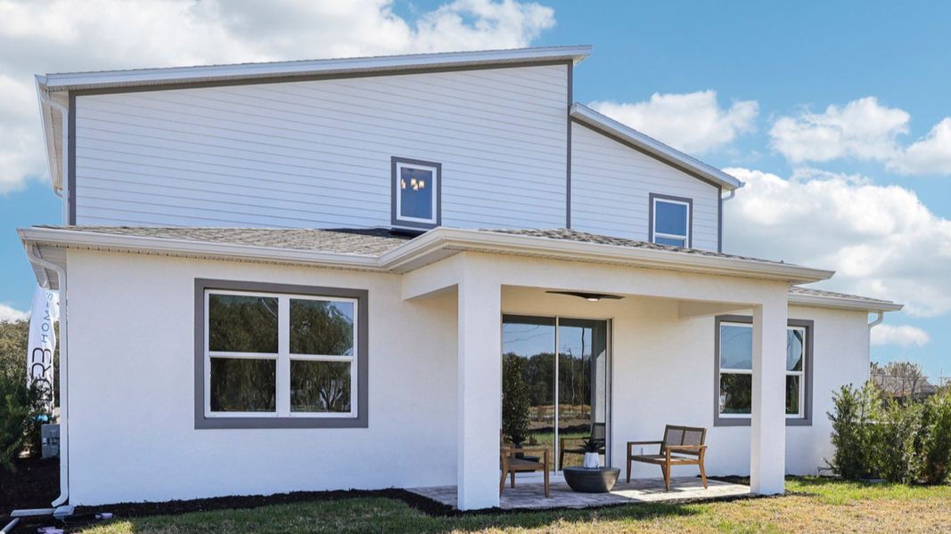 The Mangrove Model Rear Exterior in Modern Elevation at Lakeside at Satilla by DRB Homes in Saint Cloud, FL