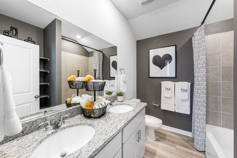 Image 22 representing the Finch by Taylor Morrison in Longview 50s, Del Valle, TX.